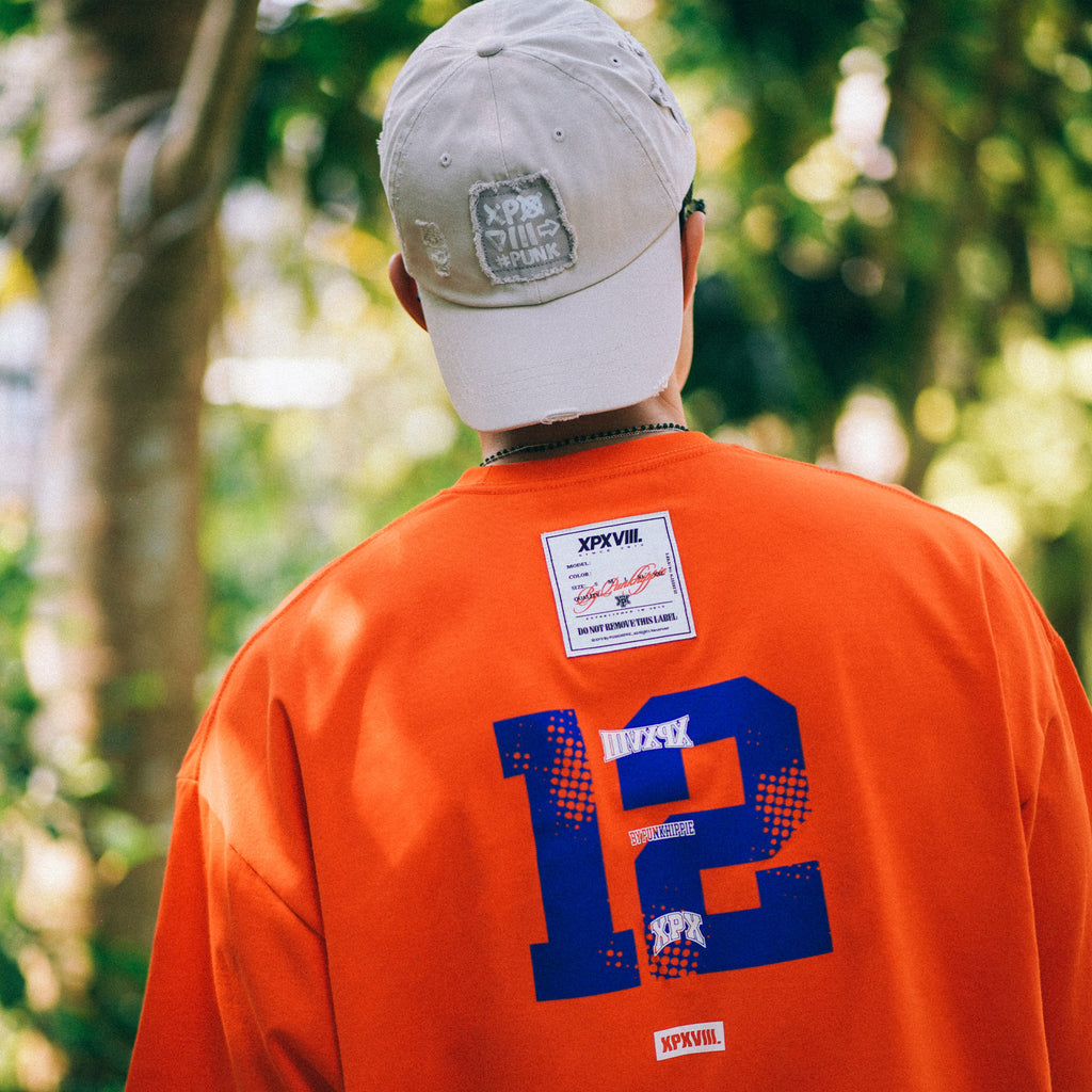 XPX NO.12 WITH LOGOS ORANGE CREW NECK TEE