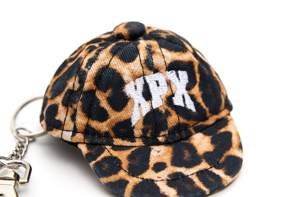 XPX LEOPARD CAP KEY HOLDER IN BROWN